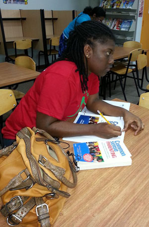 Taking notes during the session.